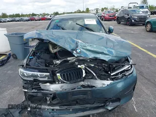 2020 BMW 3 Series 330i xDrive with VIN 3MW5R7J03L8B09157, listed as a IAAI auction lot 39168393 with 69,052 mi miles. Bid and sale history available at carsss.com. Image 11.