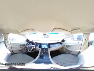 2016 Ford Taurus SEL with VIN 1FAHP2H89GG122884, listed as a Copart auction lot 53597595 with 128,627 mi miles and Salvage title. Bid and sale history available at DreamBid. Image 14.