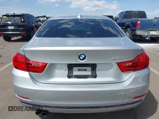 2015 BMW 4 Series 428i with VIN WBA3N7C54FK225045, listed as a IAAI auction lot 42042980 with 72,909 mi miles. Bid and sale history available at carsss.com. Image 16.