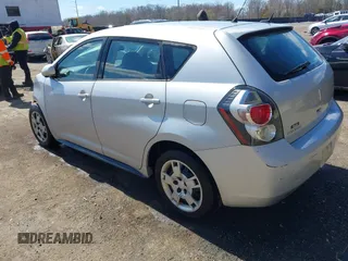 2009 Pontiac Vibe with VIN 5Y2SM67049Z409441, listed as a IAAI auction lot 41873091 with 145,169 mi miles. Bid and sale history available at carsss.com. Image 3.