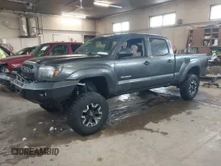 2009 Toyota Tacoma with VIN 5TEMU52N99Z668548, listed as a IAAI auction lot 41507218 with 153,565 mi miles and . Bid and sale history available at DreamBid. Image 2.