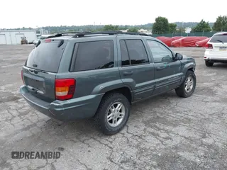 2004 Jeep Grand Cherokee Laredo with VIN 1J4GW48S24C276284, listed as a IAAI auction lot 42596655 with 142,524 mi miles and . Bid and sale history available at DreamBid. Image 4.