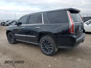 2017 Cadillac Escalade Premium Luxury with VIN 1GYS3CKJ4HR337750, listed as a Copart auction lot 87628035 with 107,142 mi miles and Clean title. Bid and sale history available at DreamBid. Image 2.