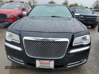 2013 Chrysler 300 with VIN 2C3CCAET1DH568910, listed as a Copart auction lot 50037004 with 136,228 mi miles and Salvage Title. Bid and sale history available at carsss.com. Image 5.