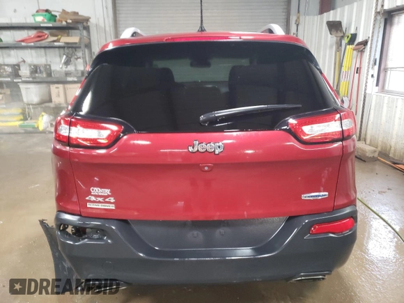 2015 Jeep Cherokee Latitude with VIN 1C4PJMCS5FW624799, listed as a Copart auction lot 52339795 with 142,681 mi miles and Salvage Title. Bid and sale history available at DreamBid. Image 6.