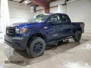 2011 Toyota Tundra 4WD Truck with VIN 5TFUW5F14BX197942, listed as a Copart auction lot 47951895 with 199,476 mi miles and Salvage Title. Bid and sale history available at carsss.com. Image 1.