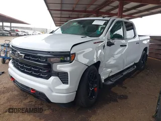 2023 Chevrolet Silverado 1500 with VIN 1GCPADE89PZ115977, listed as a IAAI auction lot 42025071 with 27,635 mi miles and . Bid and sale history available at DreamBid. Image 2.