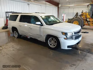 2018 Chevrolet Suburban LT with VIN 1GNSKHKC8JR211976, listed as a IAAI auction lot 40753333 with 156,413 mi miles. Bid and sale history available at carsss.com. Image 1.