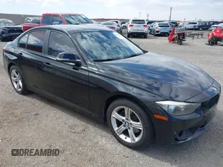 2013 BMW 3 Series 328i with VIN WBA3C1C5XDF444200, listed as a IAAI auction lot 42204600 with 113,274 mi miles and . Bid and sale history available at carsss.com. Image 1.