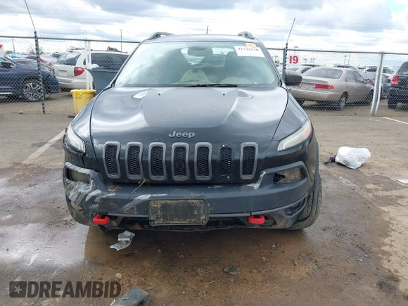 2014 Jeep Cherokee Trailhawk with VIN 1C4PJMBS5EW128658, listed as a IAAI auction lot 41722320 with 1 mi miles. Bid and sale history available at carsss.com. Image 6.