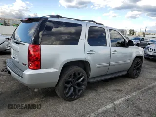 2014 GMC Yukon SLT with VIN 1GKS1CE05ER197674, listed as a Copart auction lot 45934674 with 130,623 mi miles and Salvage Title. Bid and sale history available at carsss.com. Image 3.
