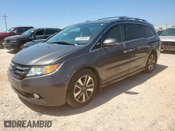 2015 Honda Odyssey Touring Elite z VIN 5FNRL5H97FB002739, wystawiony jako Copart lot #62060695 z przebiegiem 194 604 mil mil oraz Szkoda całkowita • Salvage title. Historia ofert i sprzedaży dostępna na DreamBid. Obrazek 1.
