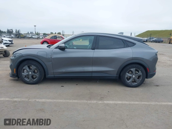 2021 Ford Mustang Mach-E Select z VIN 3FMTK1RM8MMA18120, wystawiony jako IAAI lot #42077686 z przebiegiem 71 626 mil mil oraz . Historia ofert i sprzedaży dostępna na DreamBid. Obrazek 14.