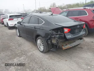 2016 Ford Fusion Energi SE Luxury with VIN 3FA6P0PU2GR322430, listed as a IAAI auction lot 42038508 with 114,980 mi miles. Bid and sale history available at carsss.com. Image 3.