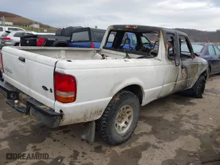 1999 Ford Ranger XLT with VIN 1FTZR15X1XTA43425, listed as a IAAI auction lot 41138156 with 129,715 mi miles. Bid and sale history available at carsss.com. Image 4.