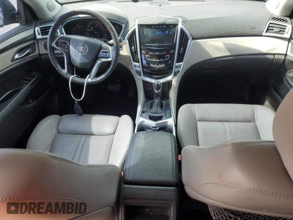 2016 Cadillac SRX Luxury Collection with VIN 3GYFNBE37GS516735, listed as a Copart auction lot 58193765 with 82,329 mi miles and Salvage title. Bid and sale history available at DreamBid. Image 8.
