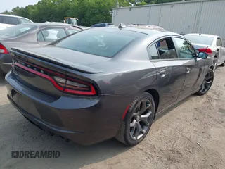 2015 Dodge Charger SXT with VIN 2C3CDXHGXFH897395, listed as a IAAI auction lot 42383907 with 145,334 mi miles and . Bid and sale history available at DreamBid. Image 4.