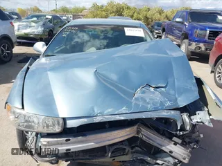 2003 Buick LeSabre Custom with VIN 1G4HP54K134150411, listed as a IAAI auction lot 42047620 with 124,795 mi miles. Bid and sale history available at carsss.com. Image 11.
