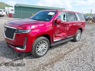 2021 Cadillac Escalade Premium Luxury z VIN 1GYS4BKL6MR453583, wystawiony jako IAAI lot #42129264 z przebiegiem 11 322 mil mil oraz . Historia ofert i sprzedaży dostępna na DreamBid. Obrazek 2.