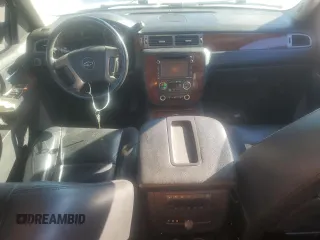 2014 Chevrolet Suburban LTZ with VIN 1GNSCKE02ER105377, listed as a Copart auction lot 76697154 with 229,461 mi miles and Salvage title. Bid and sale history available at DreamBid. Image 12.