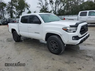 2018 Toyota Tacoma SR5 with VIN 5TFAZ5CN8JX071079, listed as a Copart auction lot 46641965 with 199,004 mi miles and Clean Title. Bid and sale history available at DreamBid. Image 4.