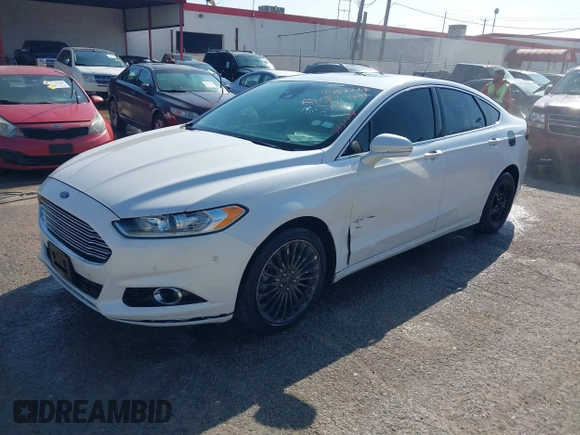 2013 Ford Fusion Titanium Hybrid with VIN 3FA6P0RU3DR343179, listed as a IAAI auction lot 41488267 with 268,872 mi miles. Bid and sale history available at carsss.com. Image 2.
