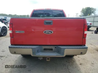 2004 Ford F-150 XLT with VIN 1FTPW14504KD65703, listed as a Copart auction lot 58792215 with 303,083 mi miles and Salvage title. Bid and sale history available at DreamBid. Image 6.