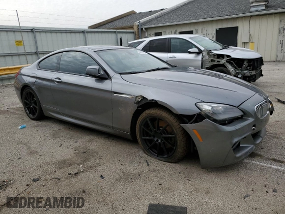 2013 BMW 6 Series 650i xDrive z VIN WBAYM1C53DDZ02397, wystawiony jako Copart lot #48872655 z przebiegiem Nie podano mil oraz Szkoda całkowita • Salvage title. Historia ofert i sprzedaży dostępna na DreamBid. Obrazek 4.