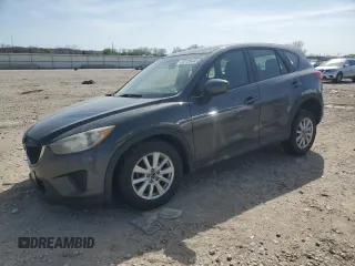 2014 Mazda CX-5 Sport z VIN JM3KE4BE8E0327321, wystawiony jako Copart lot #52135465 z przebiegiem 310 900 mil mil oraz Szkoda całkowita • Salvage title. Historia ofert i sprzedaży dostępna na DreamBid. Obrazek 1.