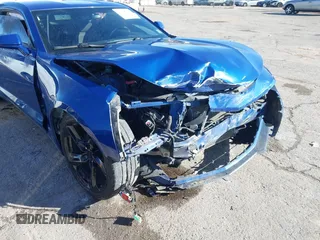 2019 Chevrolet Camaro 1LT z VIN 1G1FB1RX4K0124889, wystawiony jako IAAI lot #41316708 z przebiegiem 96 851 mil mil oraz . Historia ofert i sprzedaży dostępna na DreamBid. Obrazek 6.