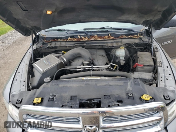 2012 Ram 1500 Big Horn z VIN 1C6RD6GT3CS166172, wystawiony jako Copart lot #59678205 z przebiegiem 165 079 mil mil oraz Szkoda całkowita • Salvage title. Historia ofert i sprzedaży dostępna na DreamBid. Obrazek 11.