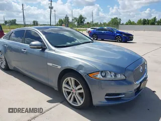2014 Jaguar XJ Portfolio with VIN SAJWA2GZ6E8V65659, listed as a IAAI auction lot 42811647 with 70,957 mi miles and . Bid and sale history available at DreamBid. Image 1.