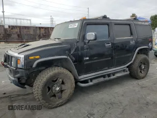 2003 Hummer H2 with VIN 5GRGN23UX3H101416, listed as a Copart auction lot 84423354 with 113,699 mi miles and Clean Title. Bid and sale history available at carsss.com. Image 1.