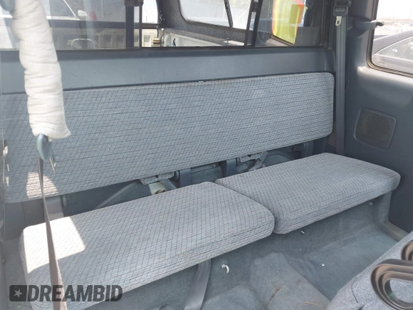 1995 Toyota T100 SR5 z VIN JT4VD12F8S0013406, wystawiony jako IAAI lot #42465291 z przebiegiem 205 683 mil mil oraz . Historia ofert i sprzedaży dostępna na DreamBid. Obrazek 8.