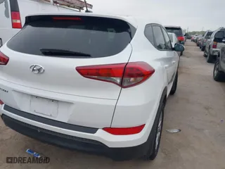 2016 Hyundai Tucson SE with VIN KM8J23A4XGU238521, listed as a IAAI auction lot 41886259 with 126,974 mi miles. Bid and sale history available at carsss.com. Image 4.