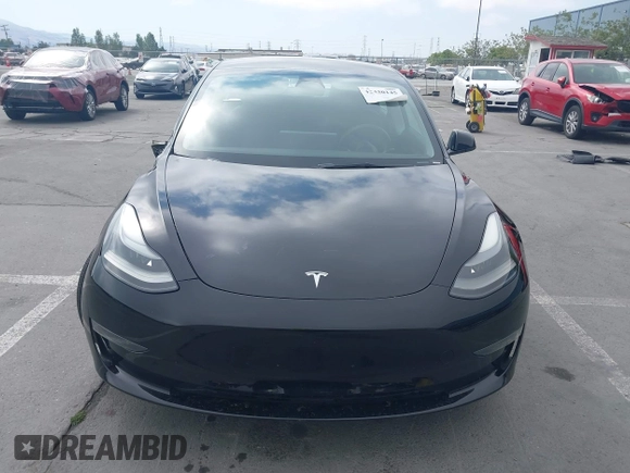 2023 Tesla Model 3 with VIN 5YJ3E1EA5PF647737, listed as a IAAI auction lot 42430145 with 20,525 mi miles and . Bid and sale history available at DreamBid. Image 12.