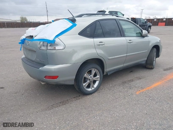 2007 Lexus RX 400h with VIN JTJHW31U972015418, listed as a IAAI auction lot 41973948 with 251,031 mi miles. Bid and sale history available at carsss.com. Image 4.