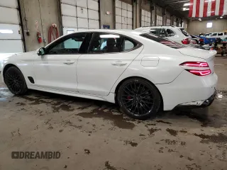 2022 Genesis G70 Launch Edition with VIN KMTG14TE6NU082327, listed as a Copart auction lot 83099774 with 33,479 mi miles and Salvage Title. Bid and sale history available at DreamBid. Image 2.