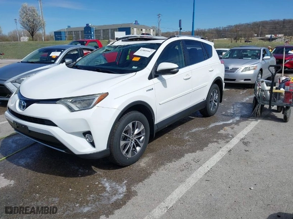 2016 Toyota RAV4 Hybrid XLE with VIN JTMRJREV1GD017731, listed as a IAAI auction lot 41860447 with 115,787 mi miles. Bid and sale history available at carsss.com. Image 2.