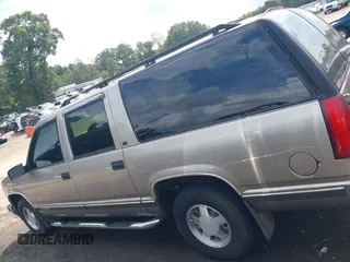1999 GMC Suburban with VIN 3GKEC16R0XG547353, listed as a IAAI auction lot 40426884 with 284,689 mi miles. Bid and sale history available at carsss.com. Image 14.