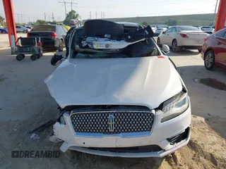 2017 Lincoln MKZ Reserve with VIN 3LN6L5EC1HR613057, listed as a IAAI auction lot 41633326 with 124,909 mi miles and . Bid and sale history available at DreamBid. Image 12.
