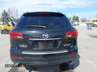 2015 Mazda CX-9 Grand Touring z VIN JM3TB2DA4F0450014, wystawiony jako IAAI lot #41692935 z przebiegiem 90 800 mil mil oraz . Historia ofert i sprzedaży dostępna na DreamBid. Obrazek 16.