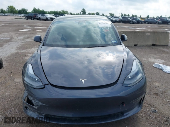 2023 Tesla Model 3 with VIN 5YJ3E1EA5PF676316, listed as a IAAI auction lot 42384765 with 33,715 mi miles and . Bid and sale history available at DreamBid. Image 12.