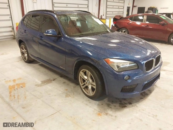 2015 BMW X1 xDrive28i with VIN WBAVL1C57FVY35998, listed as a IAAI auction lot 41740072 with 84,233 mi miles. Bid and sale history available at carsss.com. Image 1.