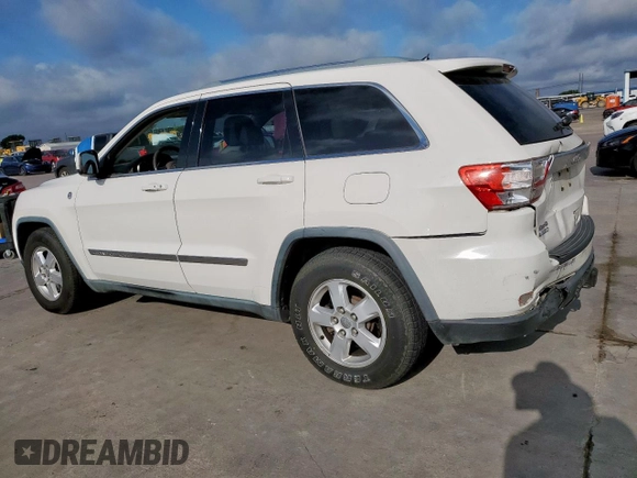2011 Jeep Grand Cherokee Laredo z VIN 1J4RR4GG2BC617810, wystawiony jako Copart lot #62424125 z przebiegiem 205 945 mil mil oraz Szkoda całkowita • Salvage title. Historia ofert i sprzedaży dostępna na DreamBid. Obrazek 2.