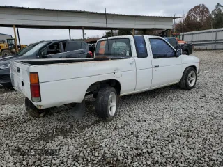 1990 Nissan Frontier with VIN 1N6SD16S9LC404281, listed as a Copart auction lot 84214904 with 279,270 mi miles and Salvage title. Bid and sale history available at DreamBid. Image 3.