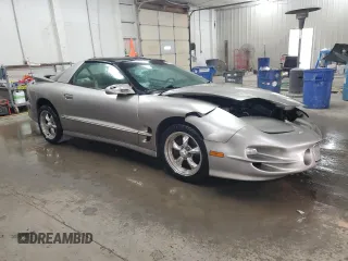 2002 Pontiac Firebird Formula z VIN 2G2FV22G222107252, wystawiony jako Copart lot #68626414 z przebiegiem 195 430 mil mil oraz Szkody całkowita. Historia ofert i sprzedaży dostępna na DreamBid. Obrazek 4.
