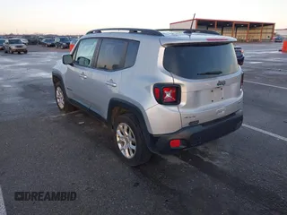 2018 Jeep Renegade Latitude with VIN ZACCJBBB9JPH73453, listed as a IAAI auction lot 41081878 with 130,898 mi miles and . Bid and sale history available at carsss.com. Image 3.
