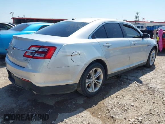 2013 Ford Taurus SEL with VIN 1FAHP2E83DG111766, listed as a IAAI auction lot 42041504 with 158,468 mi miles. Bid and sale history available at carsss.com. Image 4.
