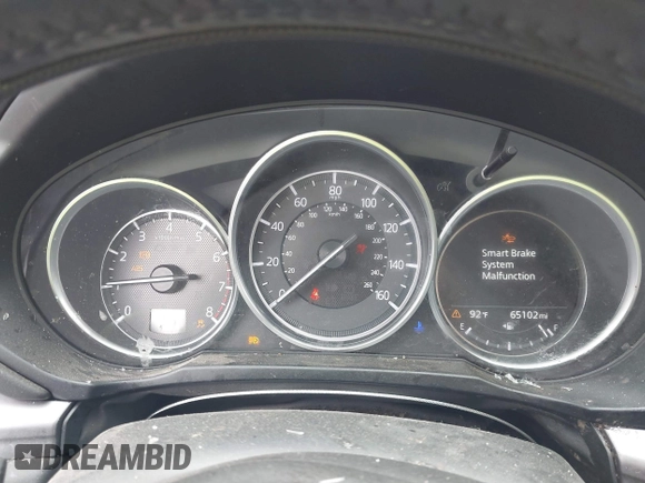 2018 Mazda CX-5 Touring z VIN JM3KFACM5J1442416, wystawiony jako IAAI lot #42093137 z przebiegiem 65 102 mil mil oraz . Historia ofert i sprzedaży dostępna na DreamBid. Obrazek 7.